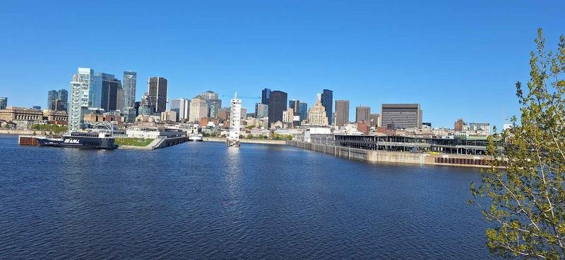 Montréal skyline and the Old Port seen across the river from Cité du Havre